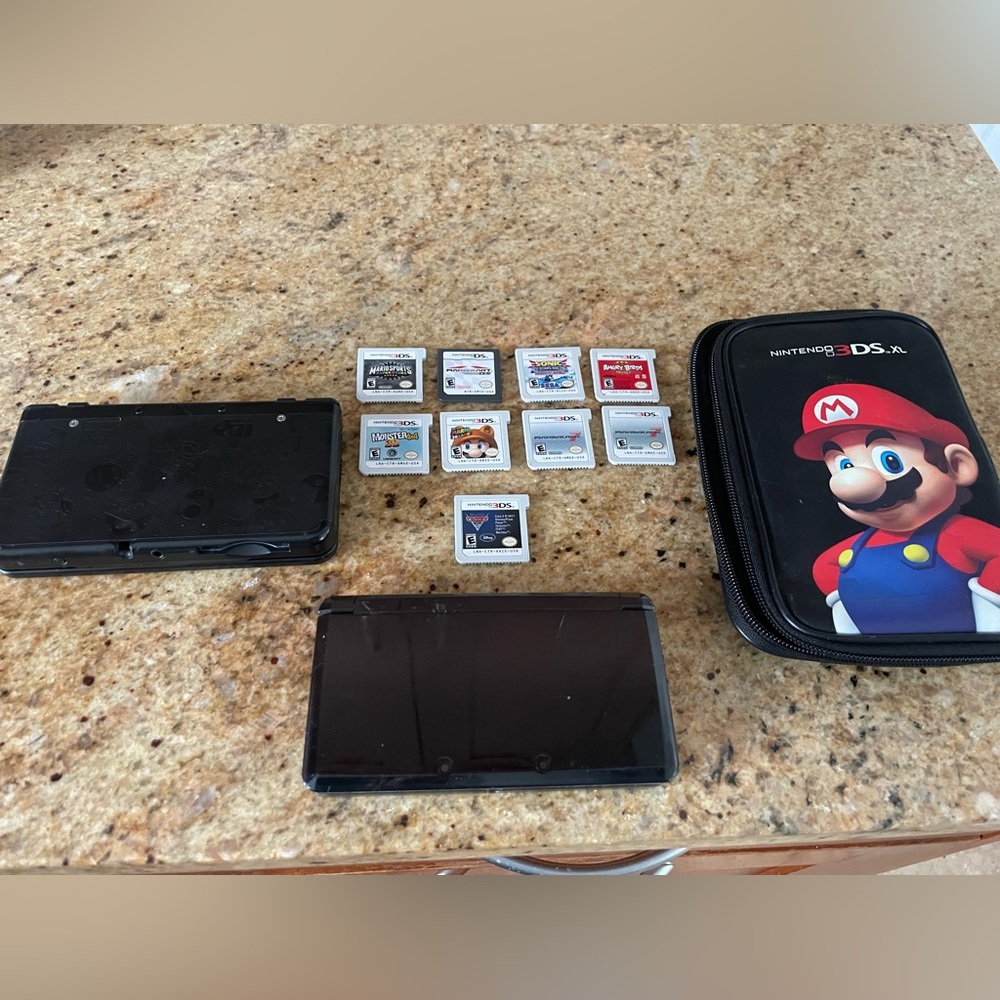 Bundle-Two Nintendo 3DS Black Consoles, Mario Case, and 9 games-